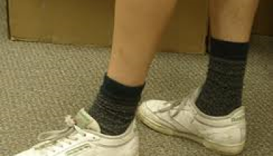Fashion faux pas: Black socks with white sneakers