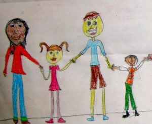 a crayon drawing of children holding hands