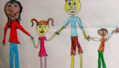 a crayon drawing of children holding hands