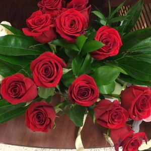 a birds eye view of a boquet of red roses 