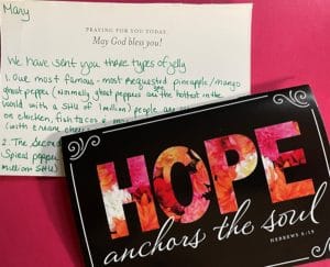 a card describing hot pepper jellies with a cover that reads Hope anchors the Soul.