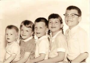 a black and white phot of the lineup of five children - Mary Stone and her siblings.
