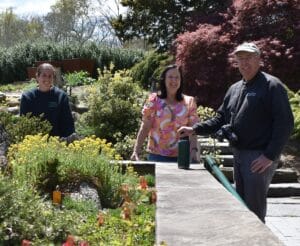 Kristen, Lori, and Bruce standing behind a sedum garden at Frelinghuysen Arboretum