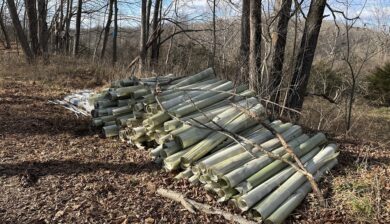 a pile of whilte six-foot long tubes along the Paulinskill Rail Trail