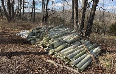 a pile of whilte six-foot long tubes along the Paulinskill Rail Trail