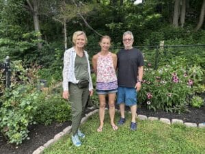 Lenora and Paul welcoming visitors to their Hillside Heaven garden during the Warwick garden tour.